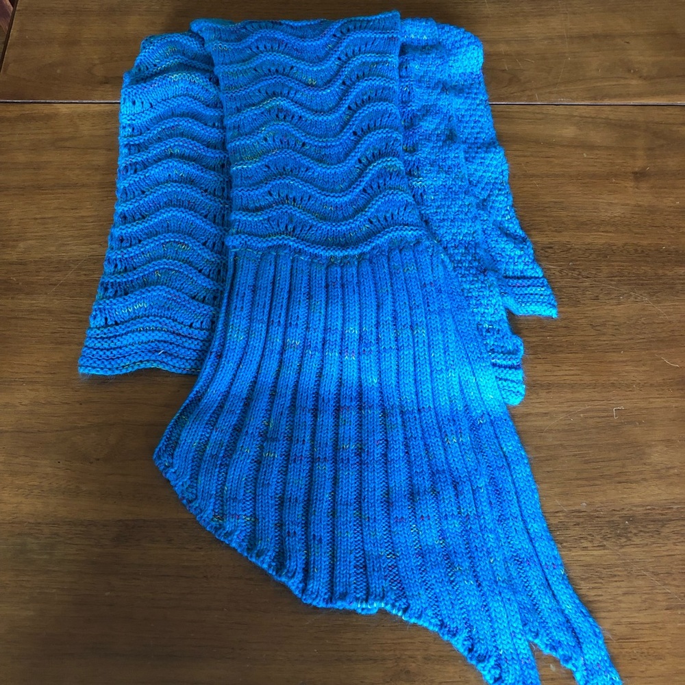 Blue knit mermaid tail blanket